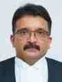 Justice Dr. Kauser Edappagath